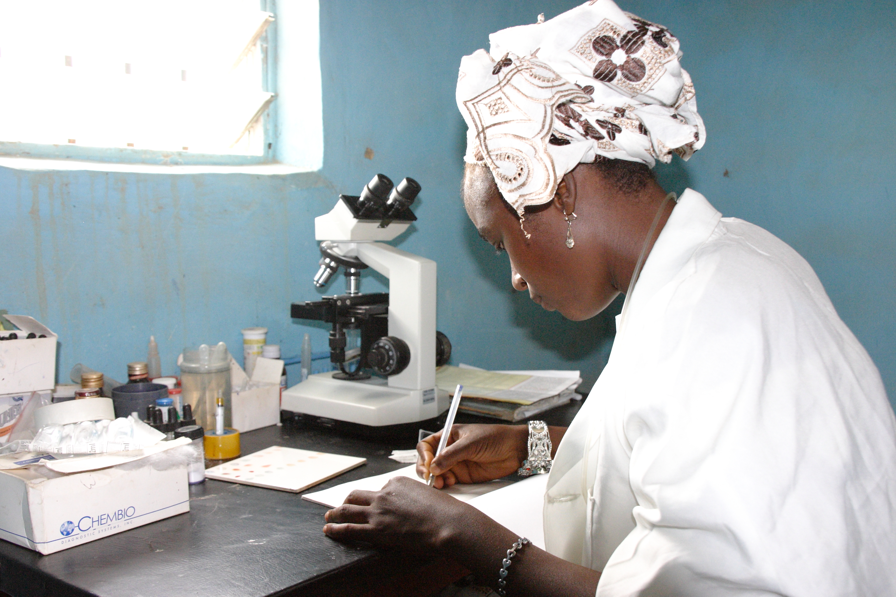 Nurse writing in od supported clinic  nigeria